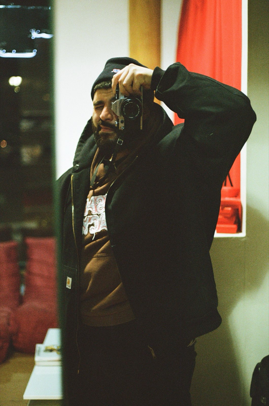 Com, self-portrait with camera